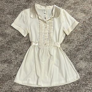 Cream casual top with satin bib/collar, wrap around satin bow, size large